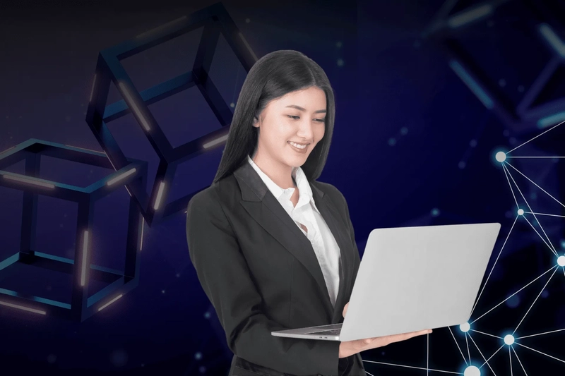 a woman is looking at the computer